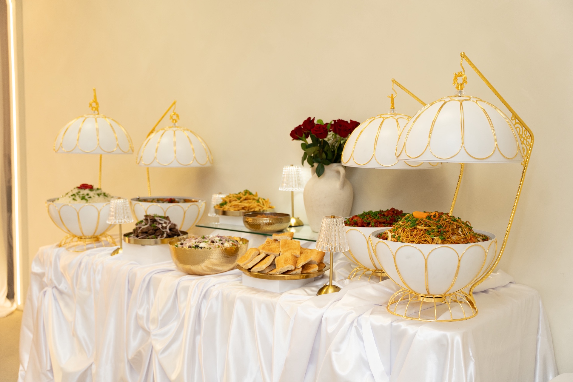 Gold-trimmed Afghan catering buffet with rice, kabob and salad by Kabul Kitchen Ajax Ontario