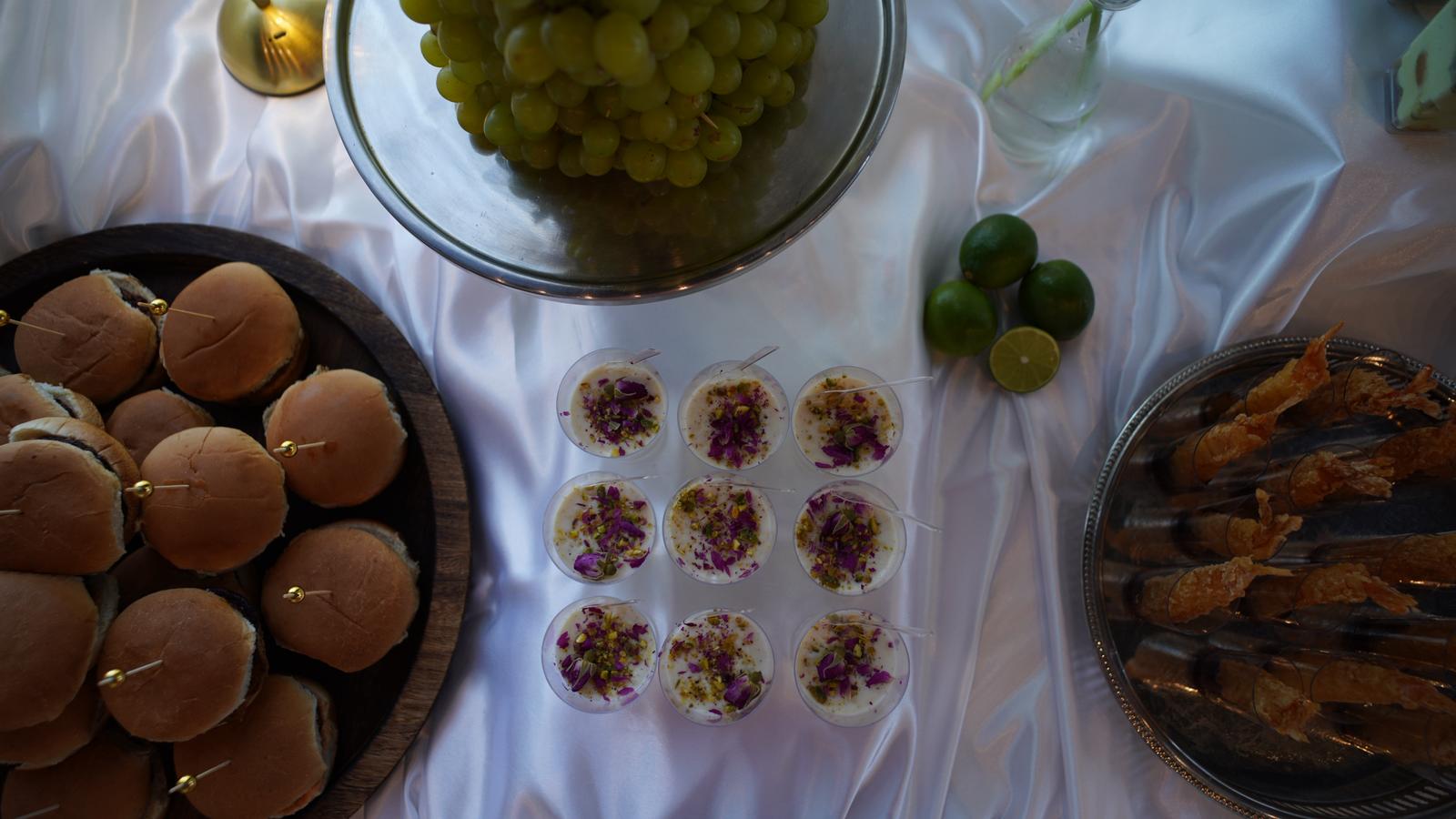 Afghan catering buffet setup with gold serving trays Kabul Kitchen and Co Ajax Ontario