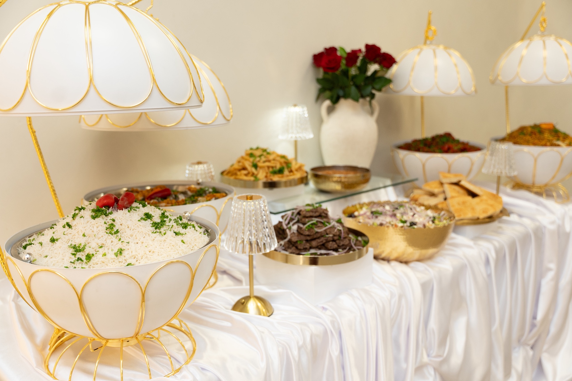 Elegant Afghan catering spread with basmati rice and kabob by Kabul Kitchen Ajax